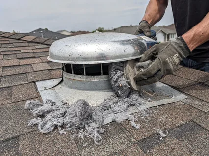 Cleaning Dryer Vent On Roof in Belmont